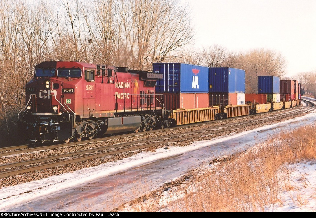 Stack train rolls west past Union